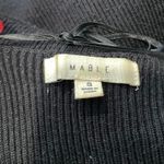 Black Mable mini bodycon knit dress with long sleeves. size small. some pilling Photo 3