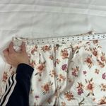 American Eagle White Romantic Floral Cuffed Hem Pleated Waist Shorts Photo 1