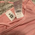 Me to We Top Photo 1