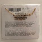 Amber Sceats  layered gold tone coin necklace Photo 3