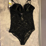 Jezebel 🆕  Black Lace One Piece Photo 9