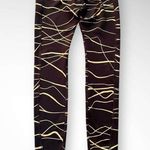 Nike  Women's‎ Icon Clash Fast Dri-Fit Black and Gold Leggings Size Small | EUC Photo 2