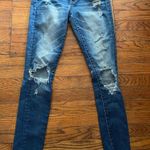 Buckle Blue Skinny Jeans with Distressed Details Photo 1