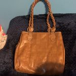 Rosetti  brown leather purse. Comes with mini purse attached to front pocket. Photo 1