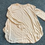 Lululemon size 8 Beige Long Sleeve Women's Top rounded bottom side slits Photo 0