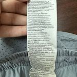 Under Armour Grey and Pink Heatgear Athletic Shorts with Pockets Size X-Small Photo 5