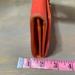 MCM  tri fold‎ wallet with bow, orange Photo 12