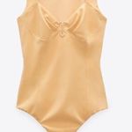 ZARA Light Yellow Bodysuit with Plunging Neckline. Photo 0