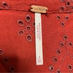 Free People rust colored eyelet jumpsuit zip up size 4β Photo 5