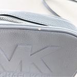 Michael Kors Tasche Jet Set Travel Oval Camera Crossbody in Pale Blue Photo 1