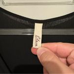 Elan  Elegant crepe V-neck faux wrap Romper black size large Photo 3