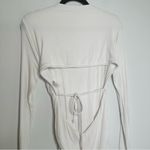 Naked Wardrobe Ruched Long Sleeve Open Back Mini Dress in Cream Photo 7
