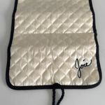 Joie  Roll up jewelry travel case. Cream quilted Satin w/ black trim Photo 1