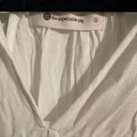 The Impeccable Pig  Cream Sleeveless Tie Front Tank Top Photo 2