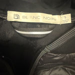 BNCI by Blanc Noir Blanc Noir Black Breakthrough Puffer Vest with Reflective Trim & Hood Size Small. Photo 7