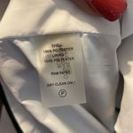 Calvin Klein black cut out dress with white lining. NWT. Photo 9