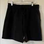 CALIA by Carrie Underwood High Waist Black Drawstring Shorts Photo 0