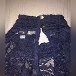 Lily White  lace shirt in navy with neck hugging color and 2 gold buttons Photo 2