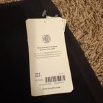 Athleta  Headland Hybrid Pant Size 0 Solid Black Zipper Pockets Nylon Blend NWT Photo 1