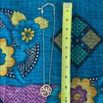 The letter “S” gold colored necklace Photo 3