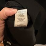 Trina Turk black shift career dress. Zip back split hem lace edge liner Size 10 Photo 7