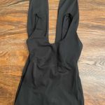 Sincerely Jules  Black Fitted Athletic Jumpsuit Size XS Excellent condition  Worn twice  Workout  Exercise  Leggings  Crossed in the back    Photo 2