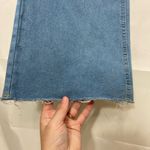 EUC Women’s medium/light wash blue stretch flare leg distressed‎ hem jeans XL Photo 2