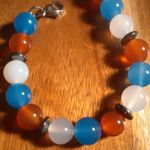 Red, White, and Blue Agate And Hematite Stainless Steel Bracelet Photo 3