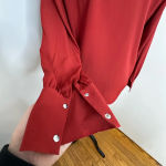 1. State Women’s Burnt Orange/red Long Sleeve Mandarin Collar Blouse. V Cutout. Cuffed. Photo 3