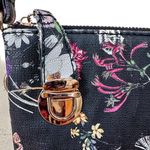 Floral purse, shoulder strap or clutch, black background with bright flowers Photo 2