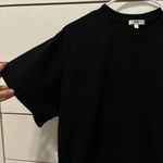 AGOLDE  Della Asymmetric T Shirt in Black Photo 4