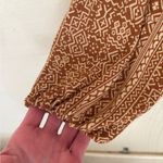 Savanna Jane Bright Long Sleeve Boho Top with Embroidery Design and Tassel Red Photo 4