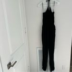 Lulus Lulu’s Learning to Fly Black Halter Jumpsuit Size: L, NWT Photo 2