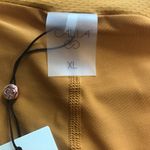 Calia by Carrie Calia Women's 14" Side Pleat Court Skort in Golden Warmth size XL NWT Photo 4