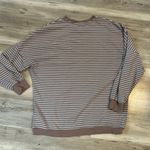 Zyia Active Size medium, 3/4 sleeve, brown base with light blue and white stripes, pit to pit is 26, length is 25 Photo 1