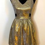 Forever 21 Metallic Gold fit and flare cut out mini party dress Photo 0