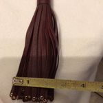 Michael Kors  Deep Chocolate Brown Tassel hang tag with Gold Hardware. Photo 5
