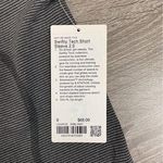 Lululemon Swiftly Tech Short-Sleeve Shirt 2.0
Hip Length - Spandex Black & White Stripe Photo 1