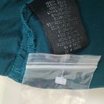 Bebe silk teal dressy top with jeweled broach Photo 3