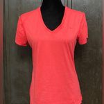 Nike Red/ orange-ish Dri-fit shortsleeved top- size Medium. Photo 0