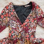 Francesca's Francesca’s Floral Ruffle Romper Photo 3