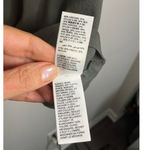 The Drop Women's @lucyswhims Fitted Cutaway Racer Tank Sweater in Capers Olive S Photo 6