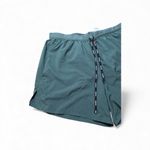 Nike ADV Running Shorts Women's Large Teal Green Split Hem Back Zip Pocket Photo 2