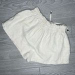 Princess Polly Polly tan / cream draw stuff ruffle flair shorts size 12 stretch waist Photo 1