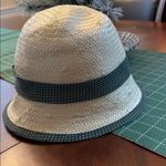 World Market woven raffia straw cloche hat with an olive green polka Photo 1