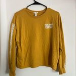 H&M Forever 21 Long Sleeve Yellow Graphic TShirt. Size Medium. Photo 0