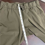 Lululemon On The Fly Crop Pants Size 6 23" Dark Olive W6AV6S EUC Travel Hiking Photo 9