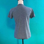 Nike The  tee dri fit top in size small Photo 1