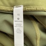 Lululemon  Invigorate High-Rise Tight 25" Size 10 Bronze Green Side Pockets Photo 4