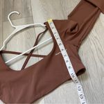 Peachy Bunz Strappy Backless Cropped Long Sleeve Workout Top Brown (Large) gym Photo 1